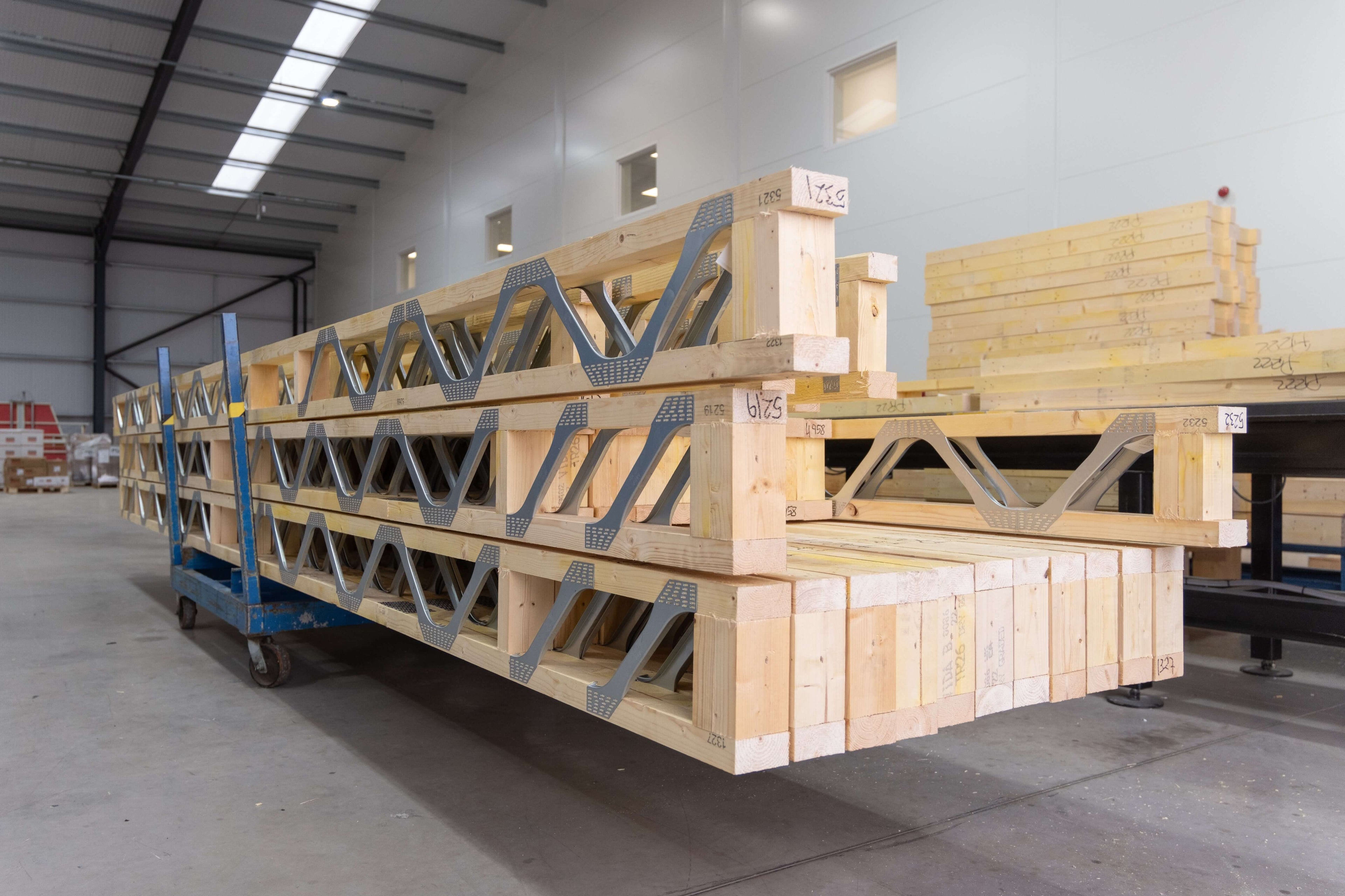 Posi Joists stacked up in a new factory