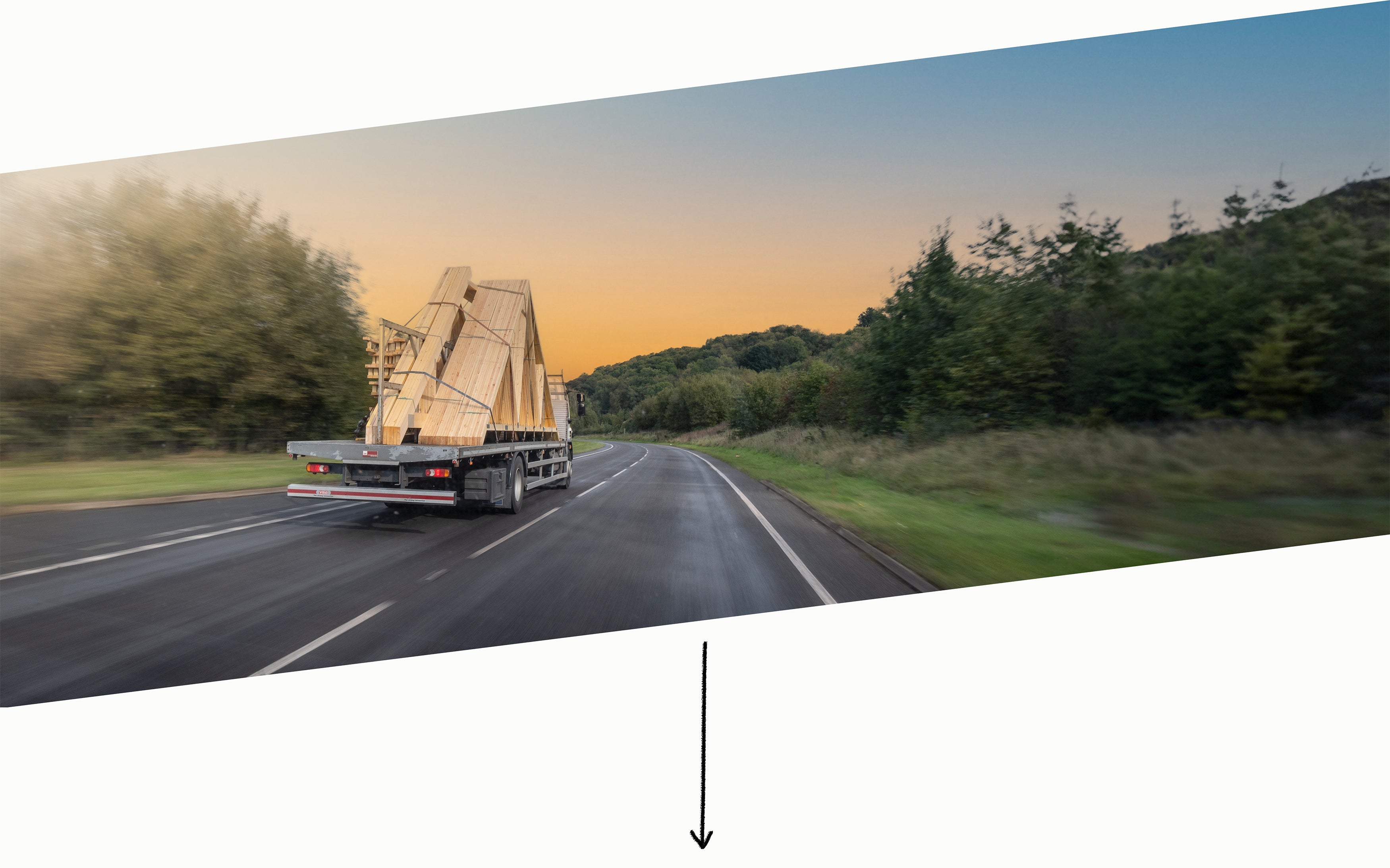 roof trusses on the back of a lorry being delivered