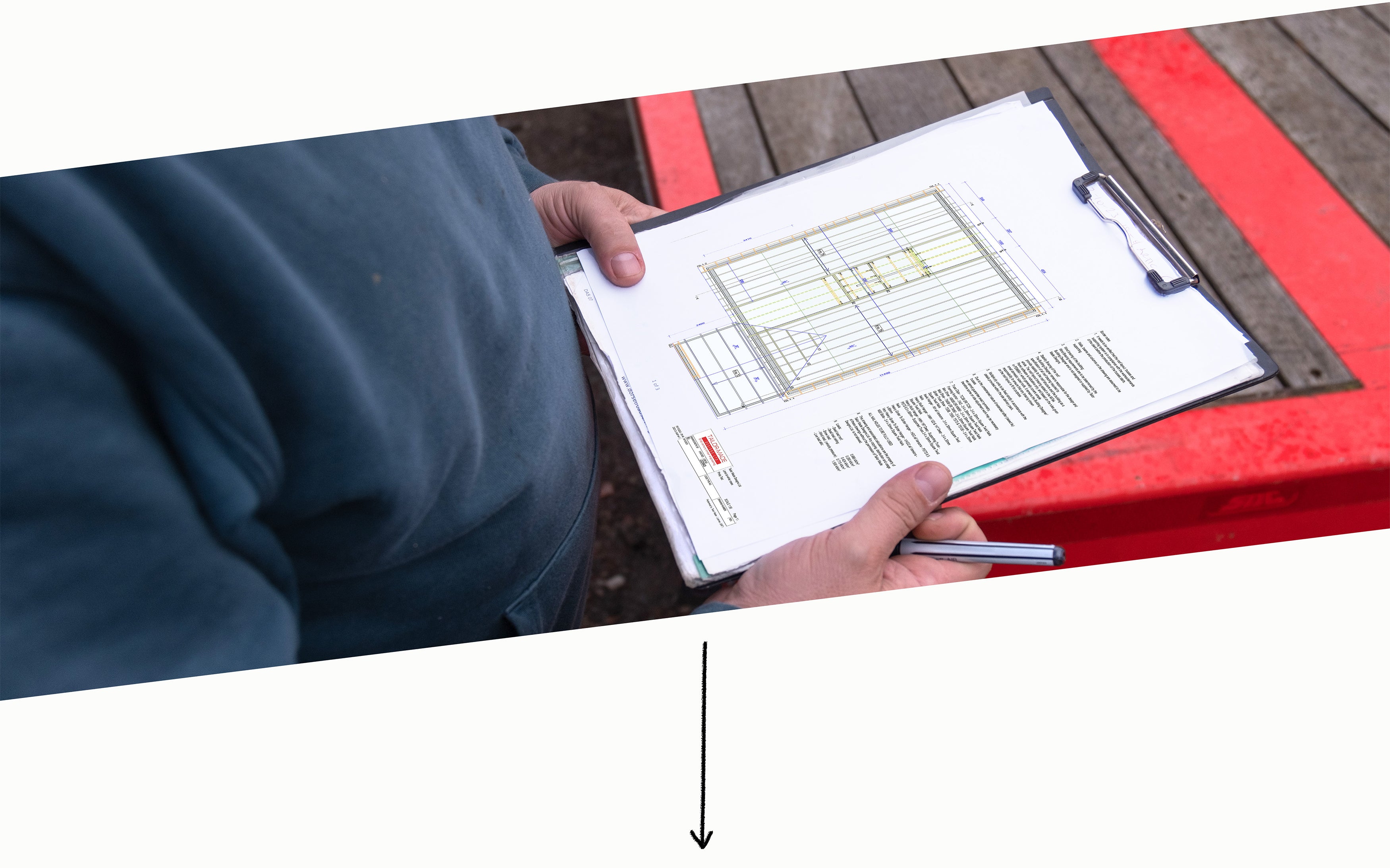 a man checking his roof truss design