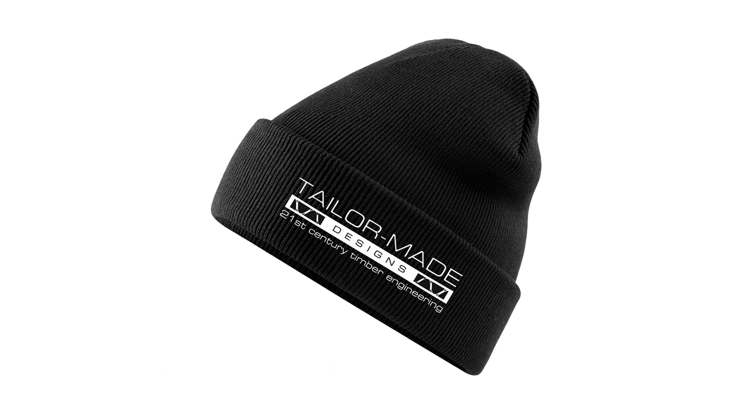 black beanie with tailor made designs logo on the brow